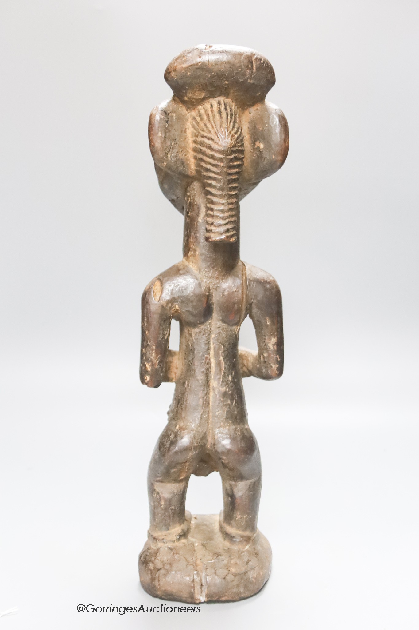 An African Luba tribal wood maternity figure, height 45cm